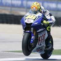 Balapan Sengit, Rossi Kalahkan Stoner